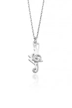 Balance Dancer Pendant ( 10 Karat white gold)- A ballerina is inset among the smooth curves of a treble clef in this unique piece of dancer jewelry.